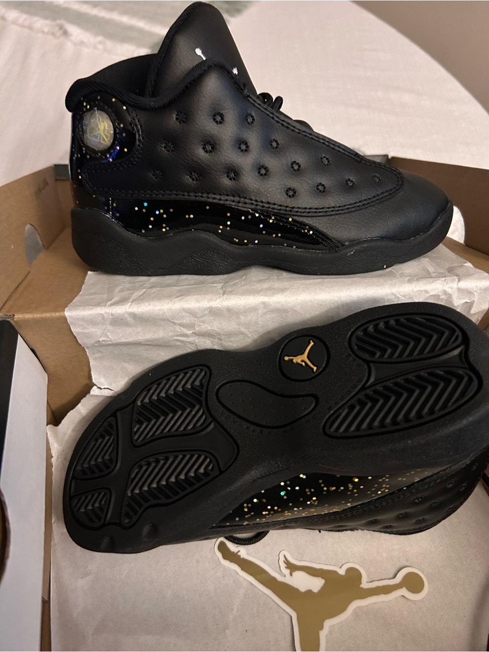 Jordan Kids Black Sneakers with Gold Jumpman and Multicolor Speckle Accents